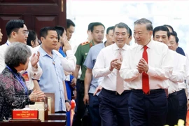 Party General Secretary To Lam (R) pays Tet visit to Ho Chi Minh City's Party organisation, administration and people. (Photo: VNA)