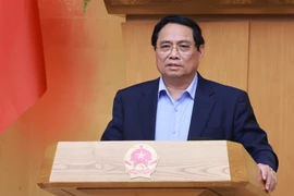 Prime Minister Pham Minh Chinh speaks at the Government’s regular meeting on November 8. (Photo: VNA)