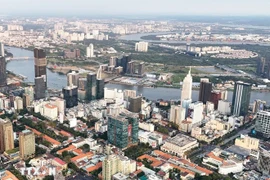 Ho Chi Minh City’s downtown area and the Thu Thiem Peninsula, where the International Financial Centre is being developed in Ho Chi Minh City. (Photo: VNA) 