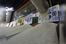Rice dealers display rice and their prices at Trabajo Market in Sampaloc, Manila. (Photo: philstar.com)