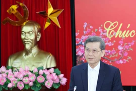 Politburo member, Secretary of the Party Central Committee and Chairman of the Party Central Committee’s Commission for Internal Affairs Le Minh Tri speaks at the meeting. (Photo: VNA)