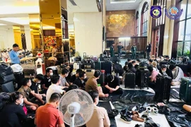 Preah Sihanouk police raid a building where an illegal online scam was operating on March 10, 2024. (Photo: Preah Sihanouk police’s Facebook)