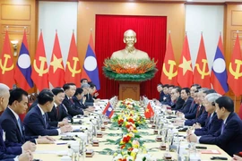 At the talks between General Secretary of the Communist Party of Vietnam Central Committee To Lam and General Secretary of the Lao People’s Revolutionary Party Central Committee and President of Laos Thongloun Sisoulith. (Photo: VNA)
