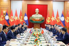 At the talks between General Secretary of the Communist Party of Vietnam Central Committee To Lam and General Secretary of the Lao People’s Revolutionary Party Central Committee and President of Laos Thongloun Sisoulith. (Photo: VNA)