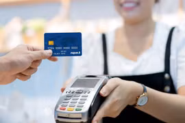 Cashless payments have far exceeded the set targets. (Photo: VietnamPlus)