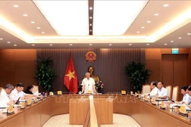Permanent Deputy Prime Minister Nguyen Hoa Binh speaks at the meeting with leaders of several ministries and sectors on the building of several decrees guiding the National Assembly’s Resolution No. 222/2025/QH15 on the international financial centre in Vietnam (Photo: VNA)
