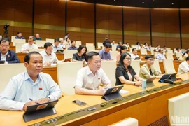 Deputies participate in 15th National Assembly’s ongoing 9th session (Photo: nhandan.vn)