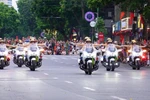 Spectacular motorbike stunts, brass band highlight ‘Peaceful Day’ in Hanoi