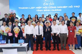 Participants in the congress held on June 19 to establish the Binh Duong Association of Supporting Industries (BASI). (Photo: VNA)