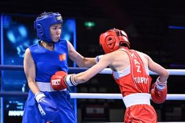Nguyen Thi Ngoc Tran of Vietnam (left) defeats Kazakhstan’s tough Gulnar Turapbay in the ASBC Asian U22 & Youth Boxing Championships' women's U22 50kg class in Colombo, Sri Lanka, on May 23. ̣(Photo of ASBC)