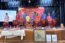 A drum performance by children at the Tet celebration held by New Sunlight for Children. (Photo: VNA)