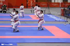 The Vietnamese athletes perform in the women's team kata event in karate at ASIAD 2026 on September 22. (Photo published by VNA)