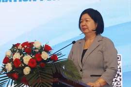 Chairwoman of the Vietnam Cooperative Alliance Cao Xuan Thu Van speaks at the workshop on December 2. (Photo: VNA)