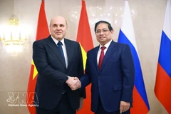 Vietnamese PM Pham Minh Chinh (R) holds talks with his Russian counterpart Mikhail Mishustin in Moscow on March 23. (Photo: VNA)
