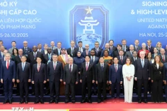 Vietnamese State President Luong Cuong (centre, first row), United Nations Secretary-General Antonio Guterres (fifth from left) and heads of delegations at the signing ceremony. (Photo: VNA)