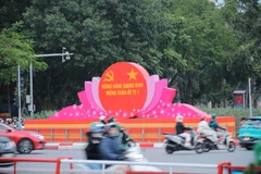 A street is decorated to mark the 95th founding anniversary of the Communist Party of Vietnam. (Photo: VNA) 