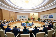 An overview of the Government's regular meeting on November 8. (Photo: VNA)
