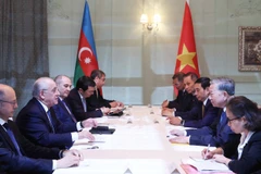 General Secretary of the Communist Party of Vietnam (CPV) Central Committee To Lam (second, right) meets with Prime Minister of Azerbaijan Ali Asadov (second, left). (Photo: VNA)