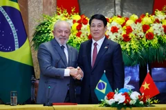 Vietnamese State President Luong Cuong (R) and Brazilian President Luiz Inácio Lula da Silva after meeting with the press in Hanoi on March 28 morning. (Photo: VNA)