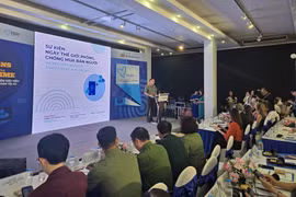 Colonel Le Hoang Duong from the Ministry of Public Security delivers the opening remarks at the event. (Photo: VNA)
