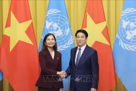 State President Luong Cuong (R) and Pauline Tamesis, United Nations (UN) Resident Coordinator in Vietnam. (Photo: VNA)