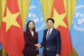 State President Luong Cuong (R) and Pauline Tamesis, United Nations (UN) Resident Coordinator in Vietnam. (Photo: VNA)