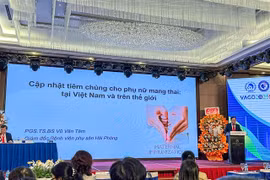 Associate Professor Dr Vu Van Tam, Vice President of the Vietnam Association of Obstetricians and Gynecologists, delivers a speech at the symposium. (Photo courtesy of the organiser)
