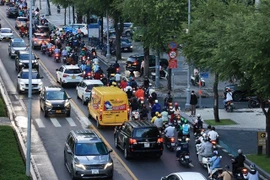 Vehicles on Ton Duc Thang Street in HCM City's Ben Nghe ward. (Photo: VNA)