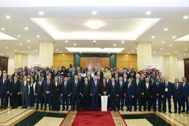 Party General Secretary To Lam and heads of the delegations attending the Hanoi Convention signing ceremony at their meeting on October 25 (Photo: VNA)