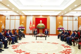 Party chief hosts Lao public security minister