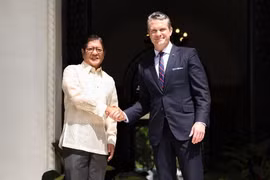 Philippine President Ferdinand Marcos Jr (left) meets with US Defence Secretary Pete Hegseth in Manila on March 28. (Photo: AFP)
