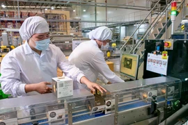 The National Assembly has approved an economic growth target of over 8% for 2025 (Photo: VNA)