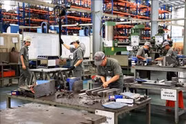 Supporting industries serve as the backbone of major manufacturing sectors by supplying components, parts and technical processes. (Illustrative photo: VNA)
