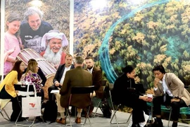 Foreign visitors at the ITB Berline 2025 show their interest in Vietnam's tourism products. (Photo: VNA)