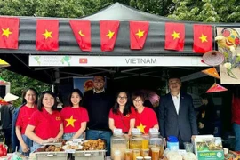 Vietnamese booth is well decorated (Photo: VNA)