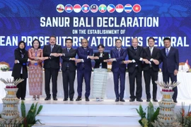 Prosecutor General of the Supreme People's Procuracy of Vietnam Nguyen Huy Tien (first from right) joins hands with attorneys general from all ASEAN member states after signing the Sanur Bali Declaration at the APAGM in Sanur, Bali, on September 15, 2025. (Photo: ANTARA)