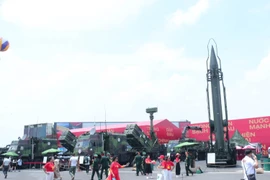 An outdoor exhibition showcases missiles and military equipment developed and upgraded by Vietnam’s Defence Industry Groups. (Photo: VNA)