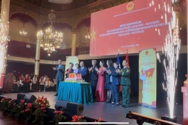Vietnamese Ambassador to France Dinh Toan Thang and delegates at the ceremony. (Photo: VNA)