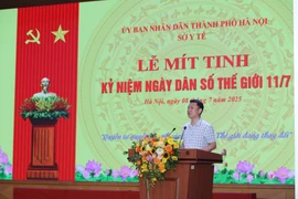 Le Thanh Dung, Director of the Population Authority under the Ministry of Health, speaks at the meeting. (Photo: VNA) 