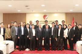Leaders of the Binh Duong Provincial People's Committee meet with a delegation from Taiwan (China)'s MiTAC Group. (Photo: VNA)