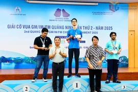 At the award ceremony (Photo: VNA)