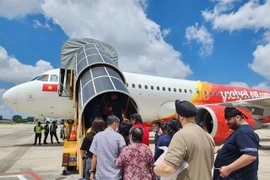 Passengers board a Vietjet plane. (Photo courtesy of Vietjet)