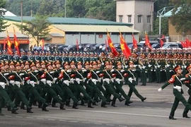 Over 10,000 people take part in the joint rehearsal for national reunification celebration. (Photo: VNA)