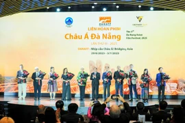 The jury members of the competition categories at the opening ceremony. (Photo: VNA)