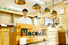 Ngo Ngoc Khanh, owner of the Macaw bookstore (Photo: I LOVE VIETNAM)