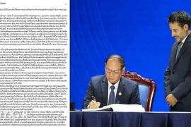 An article of Lao National Radio features Laos joining the signature ceremony (Screenshot photo: VNA)