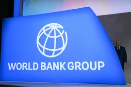 A stage director looks on at the IMF/World Bank Annual Fall Meetings Plenary Session in Washington, DC, on October 18, 2019. (Photo: AFP)