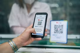 Digital payments in Vietnam expand rapidly, with QR code transactions soaring by more than 150% in value (Photo: vNA)