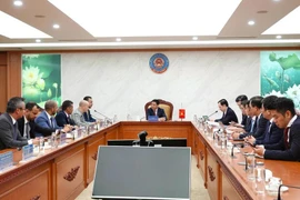 At the meeting (Photo: VNA)