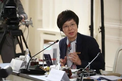 VNA General Director Vu Viet Trang poses a question to Russian President Vladimir Putin during the interview. (Photo: VNA)